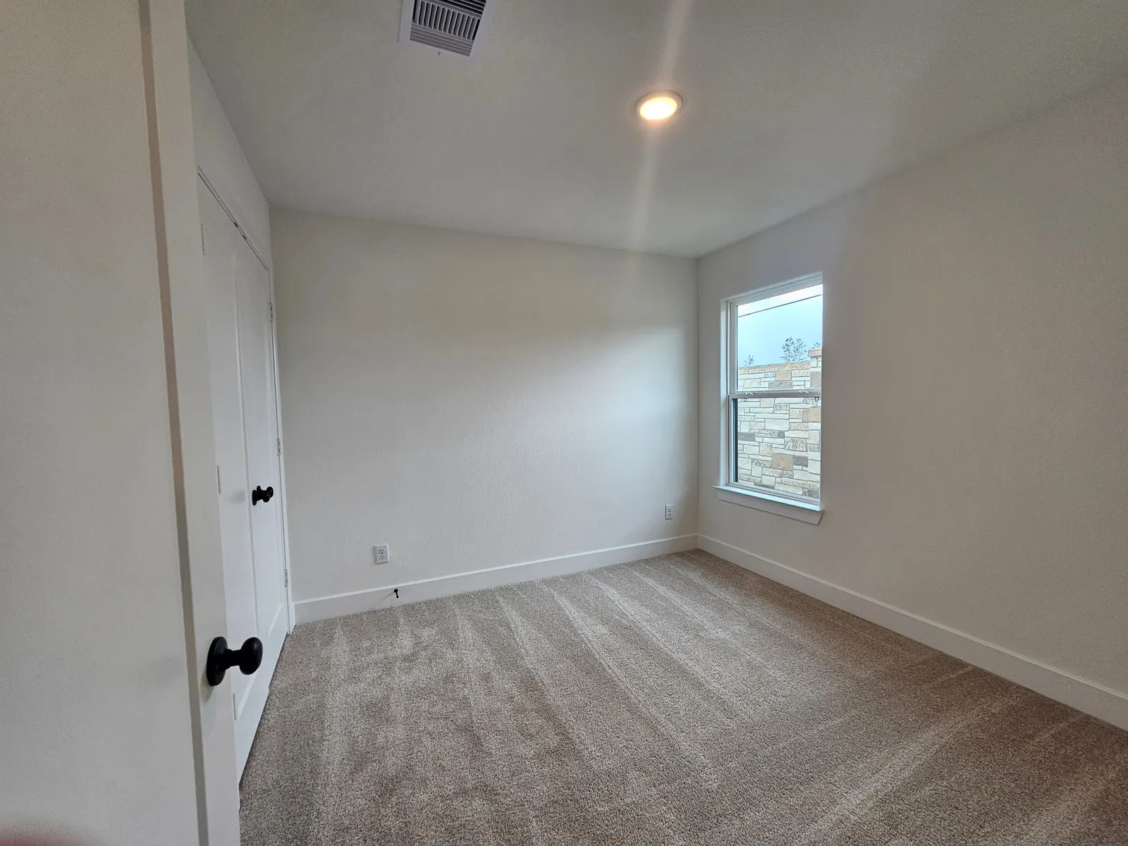 Carpeted bedroom at 10727 Crockett Meadows, Conroe, TX