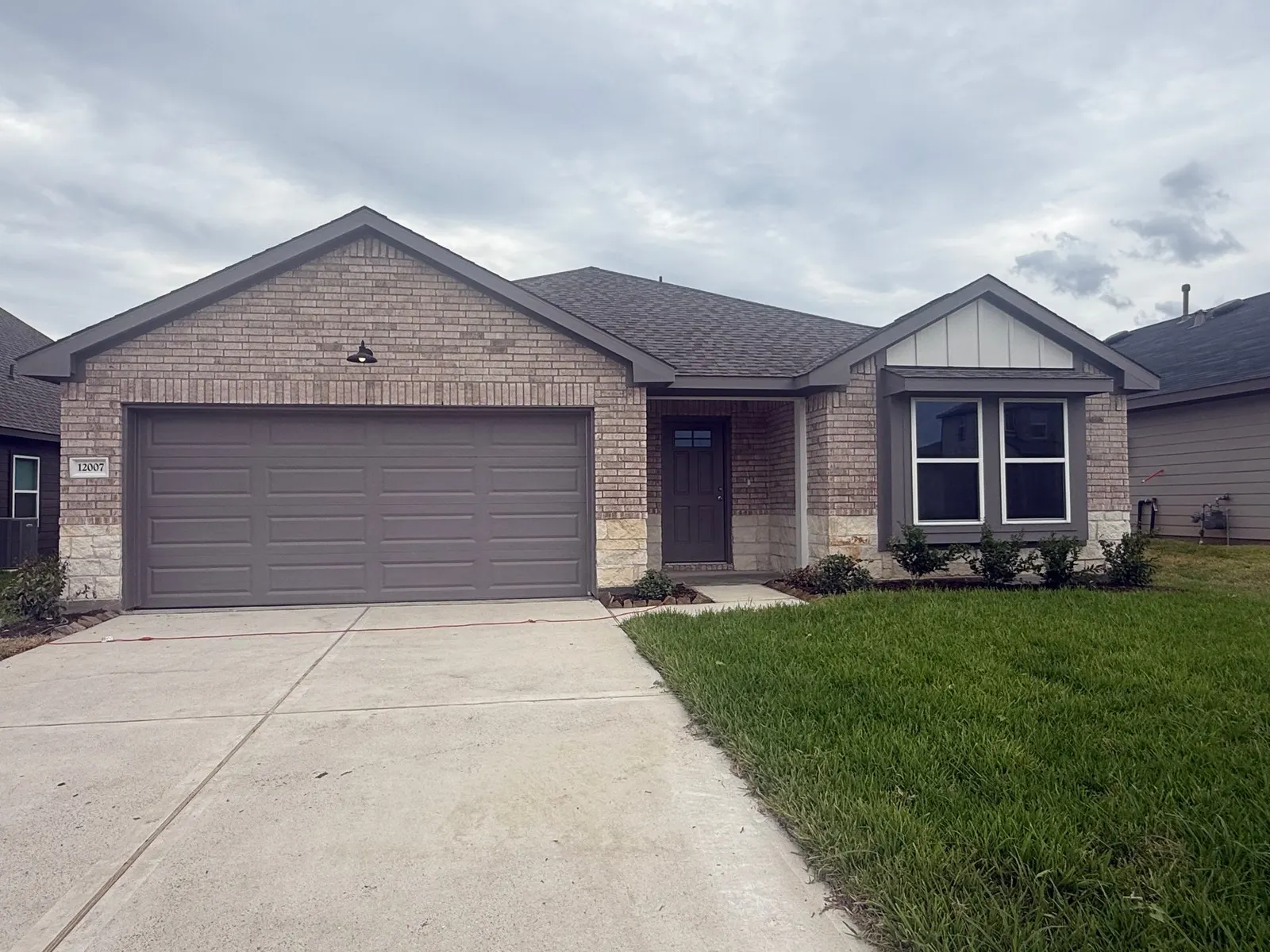 Front exterior of 12007 Curlin Drive, a new home by Alta Homes, Willis, TX