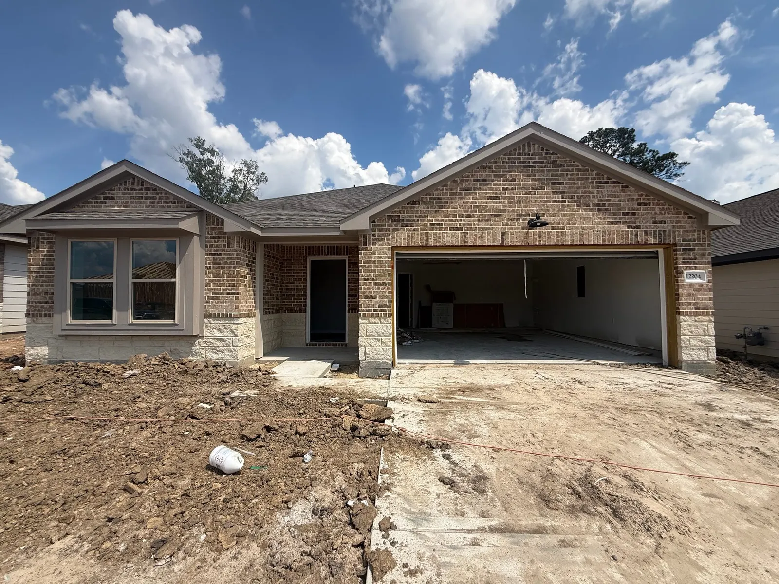 Front exterior of 12204 Lexington Heights Drive, a new home by Alta Homes, Willis, TX
