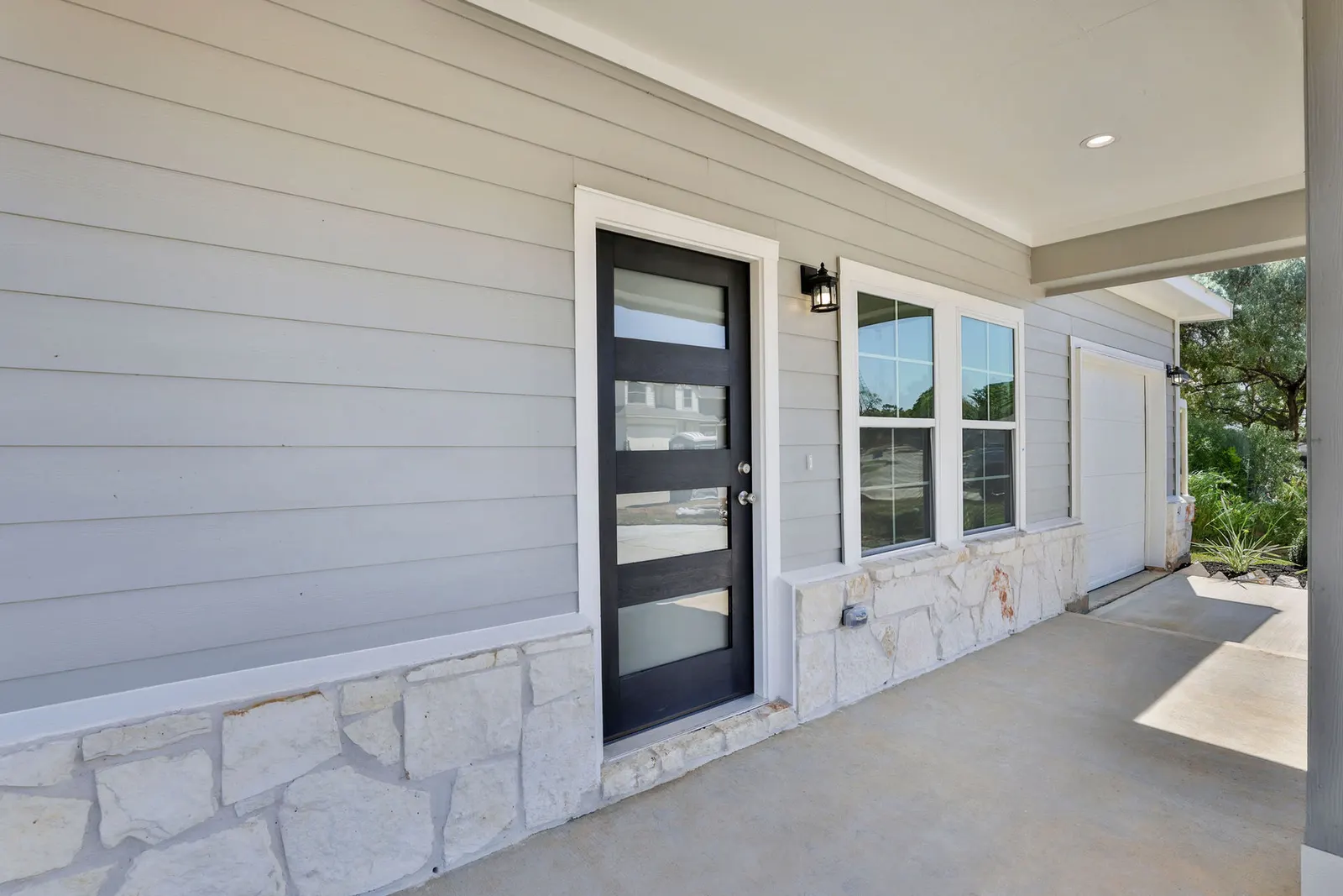Covered front porch with stone accent