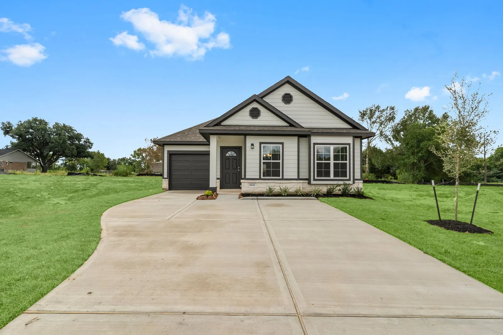 One story front exterior with driveway