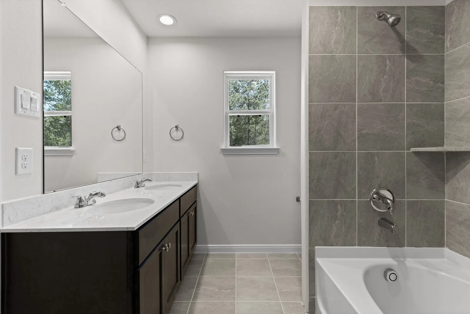 Primary bathroom with walk in shower and tub