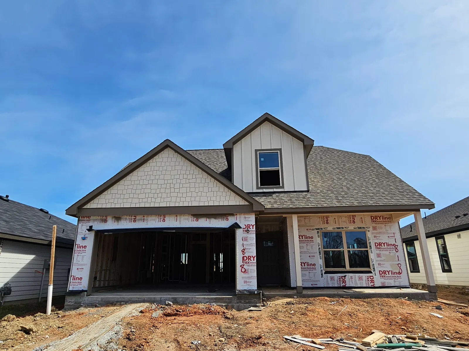 Front exterior during framing at 11830 Serena's Song Drive, Willis, TX